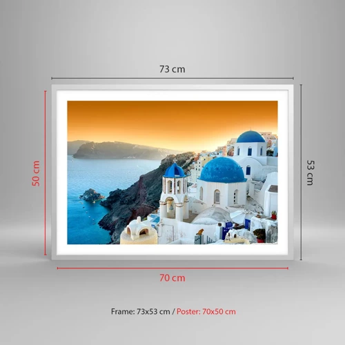 Plakat i hvid ramme - Santorini - omfavnet af klipperne - 70x50 cm