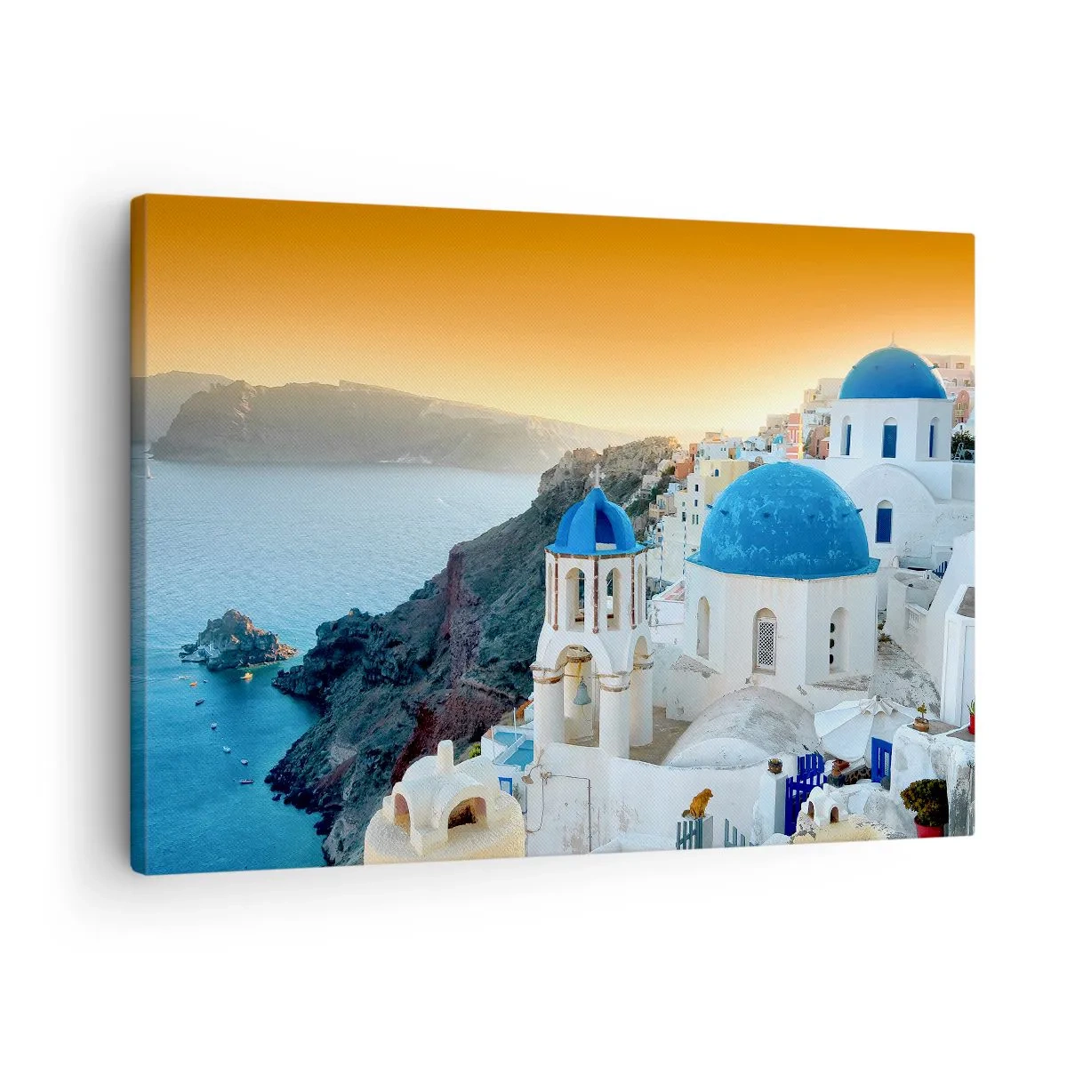 Lærredstryk - Billede på lærred - Udsigt over Santorini med hvide bygninger og blåt hav - 70x50cm - Santorini - omfavnet af klipperne - Moderne vægdekoration til stue og soveværelse ARTTOR