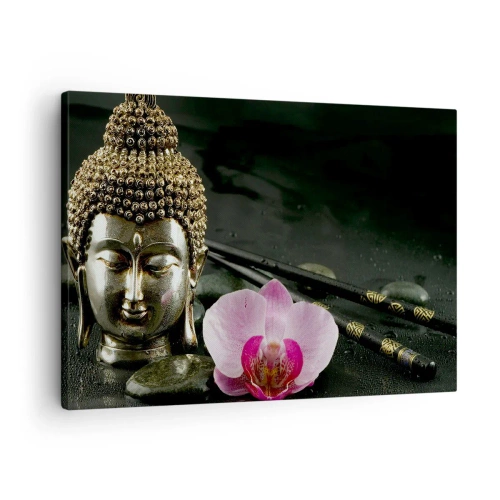 Lærredstryk - Billede på lærred - En Buddha-statue med en orkidé og spisepinde mod en baggrund af sten - 70x50cm - Harmoni mellem visdom og skønhed - Moderne vægdekoration til stue og soveværelse ARTTOR
