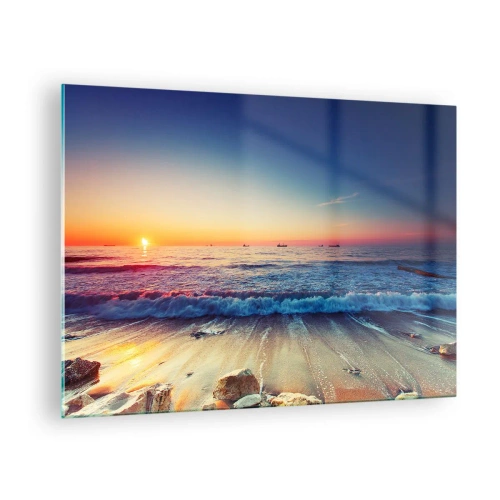 Billede på glas - Solnedgang over stranden med blide bølger og et roligt hav - 70x50cm - Og hvad er der bag horisonten? - Moderne vægdekoration til stue og soveværelse ARTTOR