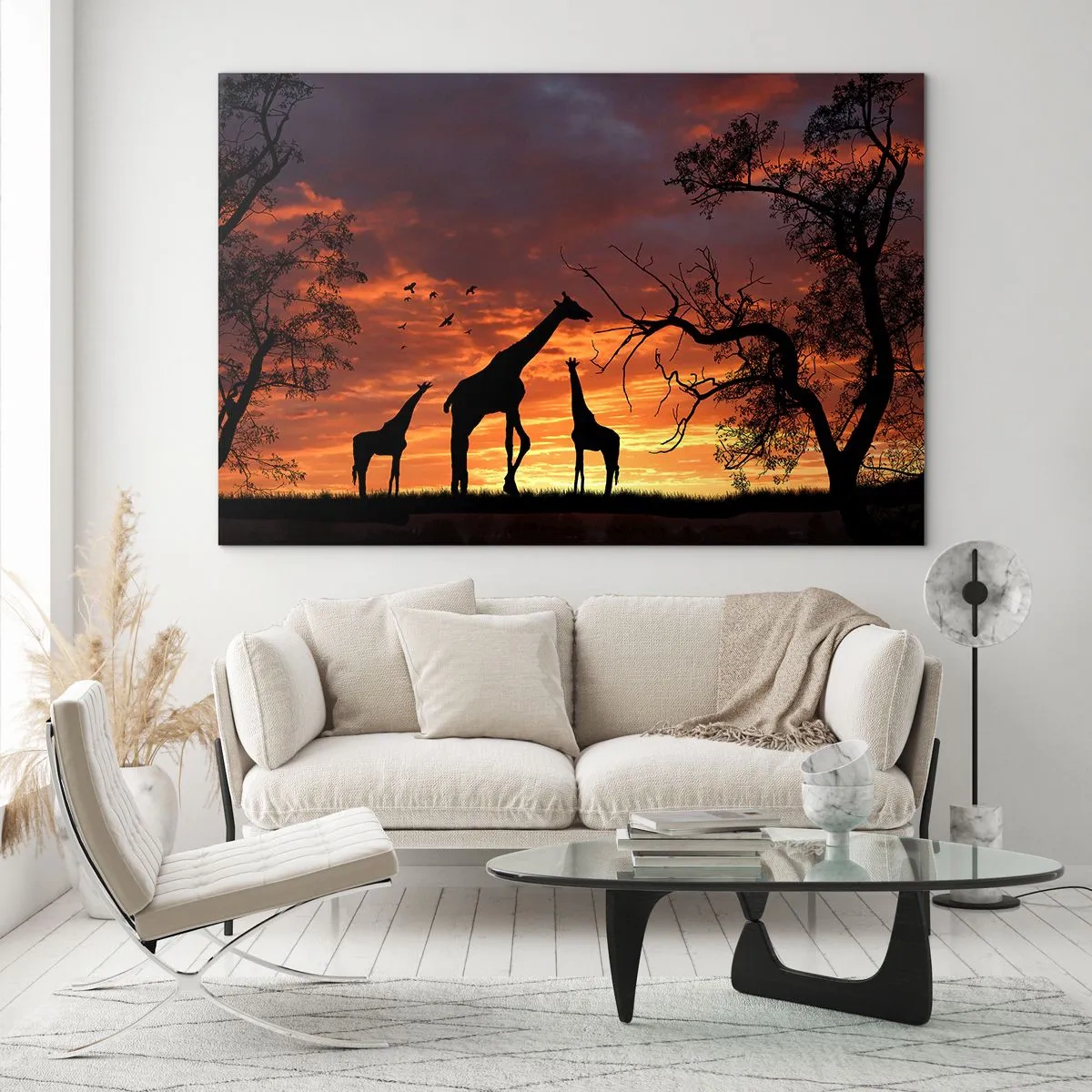 Billede på glas - Silhuetter af giraffer mod baggrunden af en solnedgang i et afrikansk landskab - 70x50cm - En lille middag med dem, du holder af - Moderne vægdekoration til stue og soveværelse ARTTOR