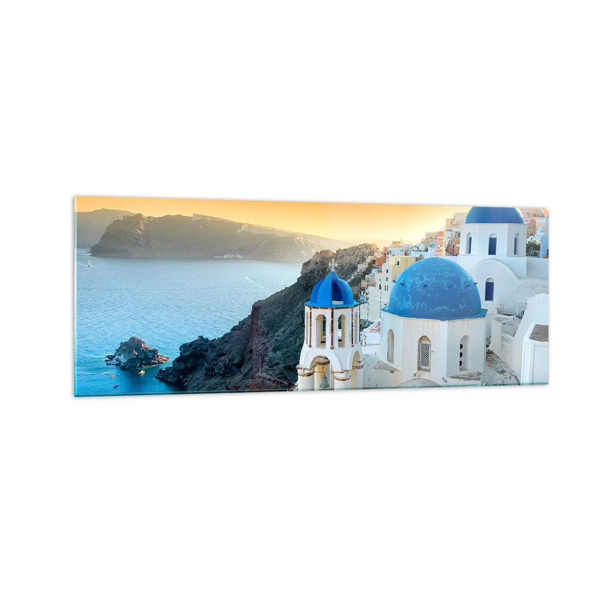 Billede på glas - Santorini - omfavnet af klipperne - 140x50 cm
