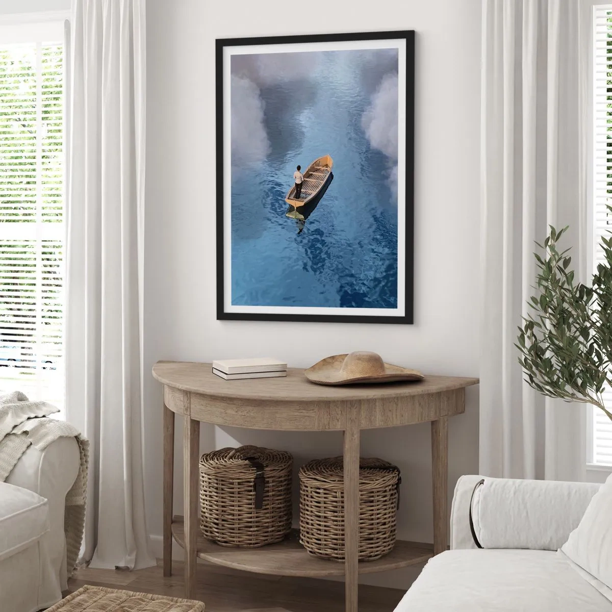 Plakat i sort ramme - En person i en båd, der flyder på vandet, og som afspejler himlen og skyerne. - 50x70cm - Livet - rejsen - det ukendte - Moderne vægdekoration til stue og soveværelse ARTTOR
