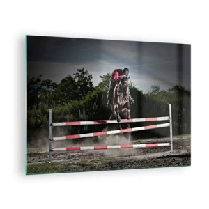 Billede på glas - En rytter på en hest hopper over en forhindring mod naturens baggrund - 70x50cm - Sammen om sejren - Moderne vægdekoration til stue og soveværelse ARTTOR