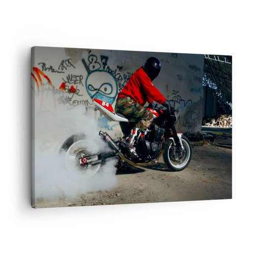 Lærredstryk - Billede på lærred - En motorcyklist udfører en spektakulær drift i en forladt bygning dækket af graffiti. - 70x50cm - Jag mig! - Moderne vægdekoration til stue og soveværelse ARTTOR