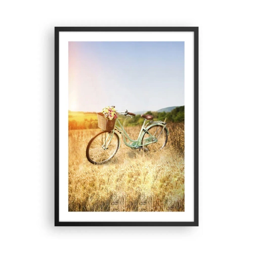 Plakat i sort ramme - En cykel med en kurv fuld af blomster på en eng - 50x70cm - Jeg bliver her et stykke tid - Moderne vægdekoration til stue og soveværelse ARTTOR