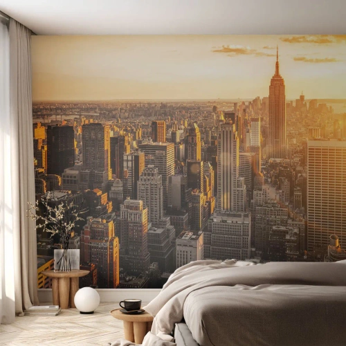 Fototapet Standard Eco - Panorama over byen i solnedgangens gyldne lys - 100x70cm - At vokse i solen - Moderne vægdekoration til stue og soveværelse ARTTOR