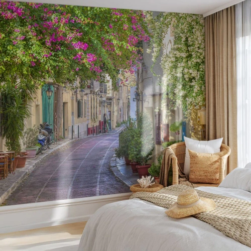 Fototapet Premium Sand - En blomstrende gyde - Arkitektur, Grækenland, By - 100x70 cm