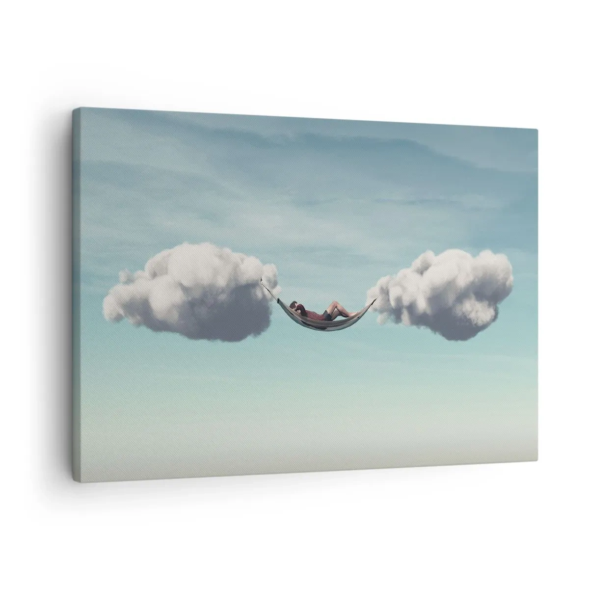 Lærredstryk - Billede på lærred - En person slapper af i en hængekøje, der svæver i skyerne - 70x50cm - Lykken i øjeblikket - Moderne vægdekoration til stue og soveværelse ARTTOR
