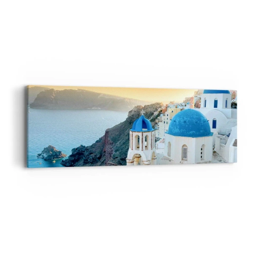 Lærredstryk - Billede på lærred - Santorini - omfavnet af klipperne - 90x30 cm