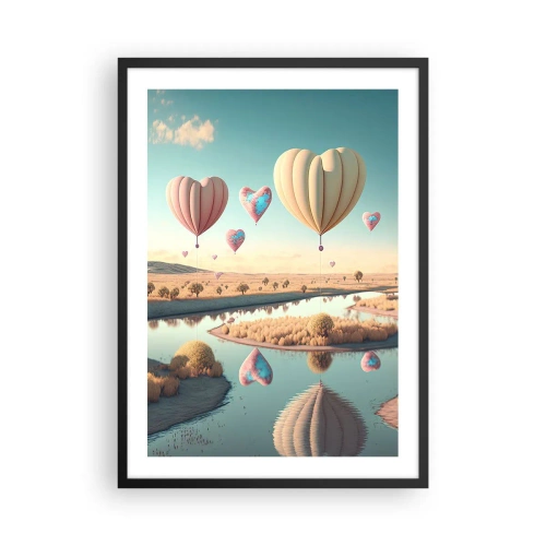 Plakat i sort ramme - Hjerteformede balloner svæver over landskabet - 50x70cm - Kærlighed lader dig svæve - Moderne vægdekoration til stue og soveværelse ARTTOR