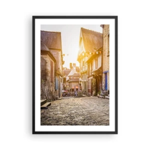 Plakat i sort ramme - En charmerende gade med lejlighedshuse i den nedgående sols stråler - 50x70cm - Byens hvide spøgelse - Moderne vægdekoration til stue og soveværelse ARTTOR
