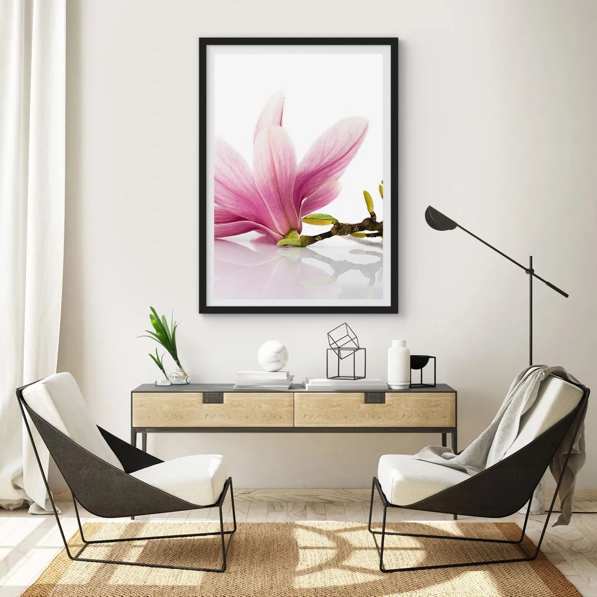 Plakat i sort ramme - Lyserød magnoliablomst på en gren med en hvid baggrund - 50x70cm - Blød som et åndedrag af forår - Moderne vægdekoration til stue og soveværelse ARTTOR