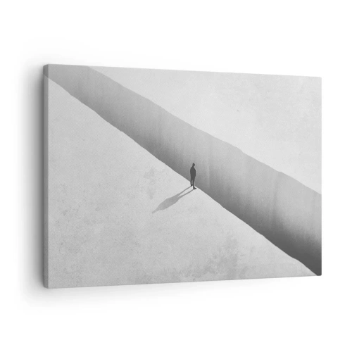 Lærredstryk - Billede på lærred - En ensom skikkelse står over en dyb kløft i en monokromatisk omgivelser. - 70x50cm - Lys destination - Moderne vægdekoration til stue og soveværelse ARTTOR