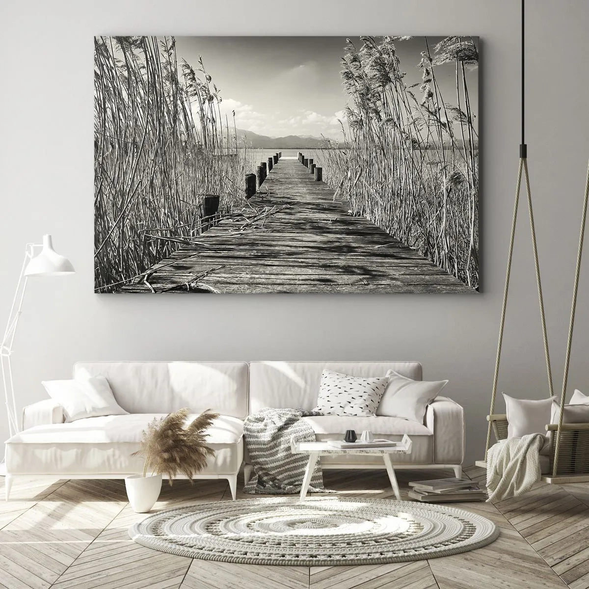 Lærredstryk - Billede på lærred - En træbro blandt høje græsser over en sepia-tonet sø - 70x50cm - I græssernes fred - Moderne vægdekoration til stue og soveværelse ARTTOR