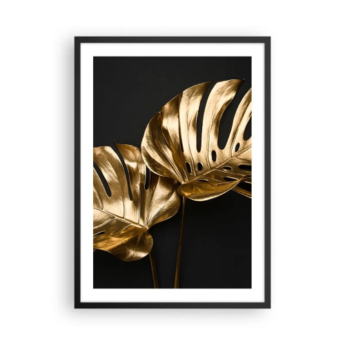 Plakat i sort ramme - Gyldne monsterablade på en sort baggrund, en elegant farvekontrast - 50x70cm - Naturens skatte - Moderne vægdekoration til stue og soveværelse ARTTOR