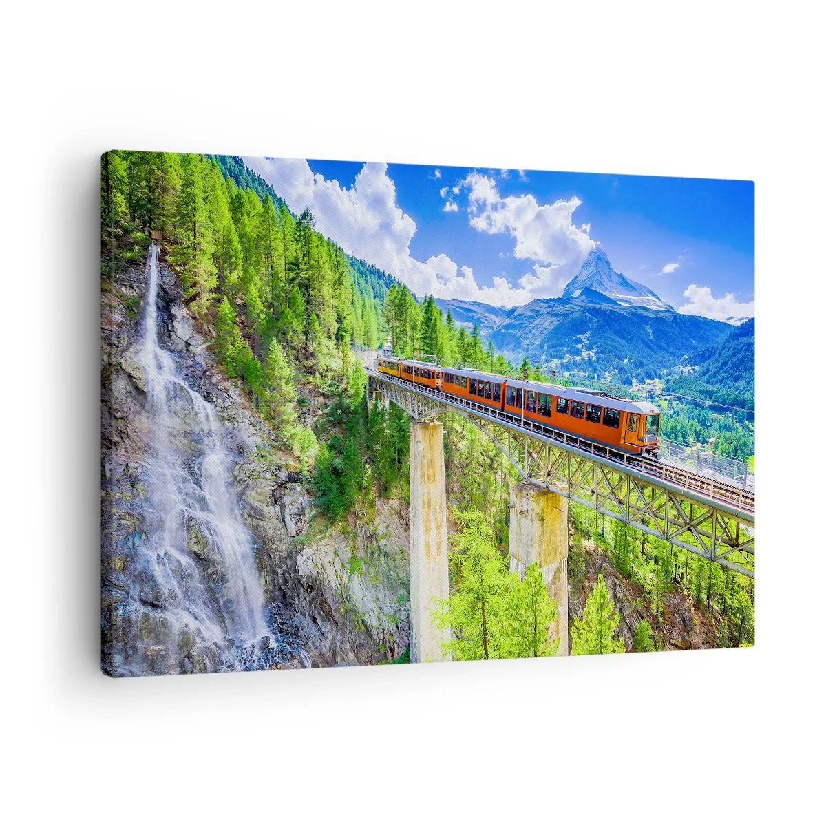 Lærredstryk - Billede på lærred - En rutsjebane på en bro med udsigt over et vandfald og bjerge - 70x50cm - Jernbane til Alperne - Moderne vægdekoration til stue og soveværelse ARTTOR