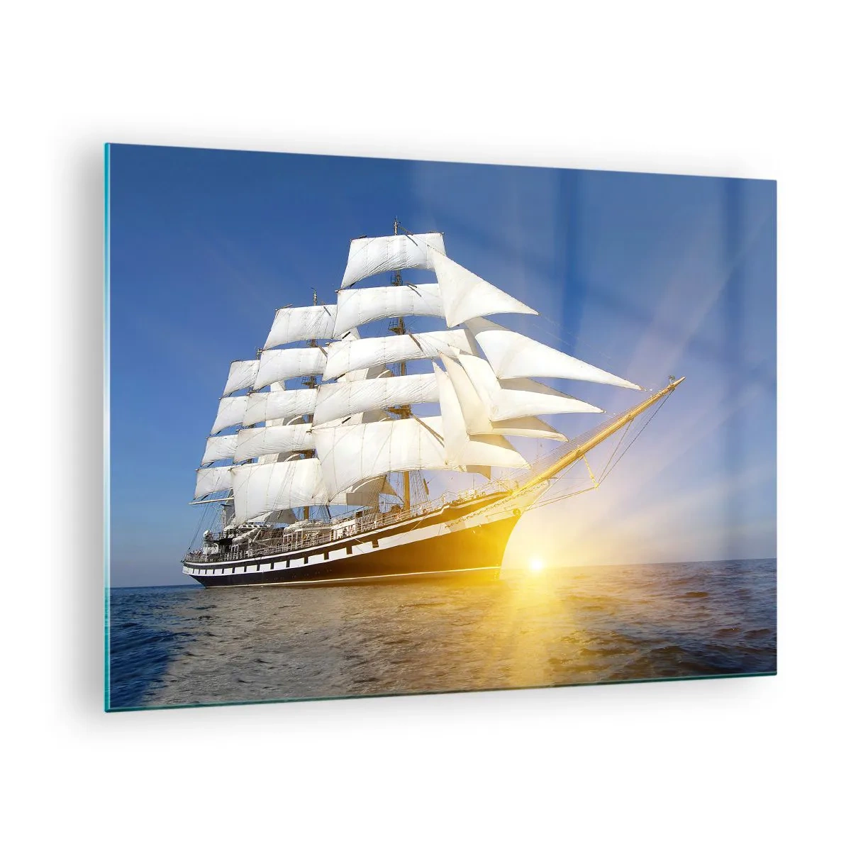 Billede på glas - Et sejlskib oplyst af solens stråler i det åbne hav - 70x50cm - Deres tid vil aldrig gå forbi - Moderne vægdekoration til stue og soveværelse ARTTOR