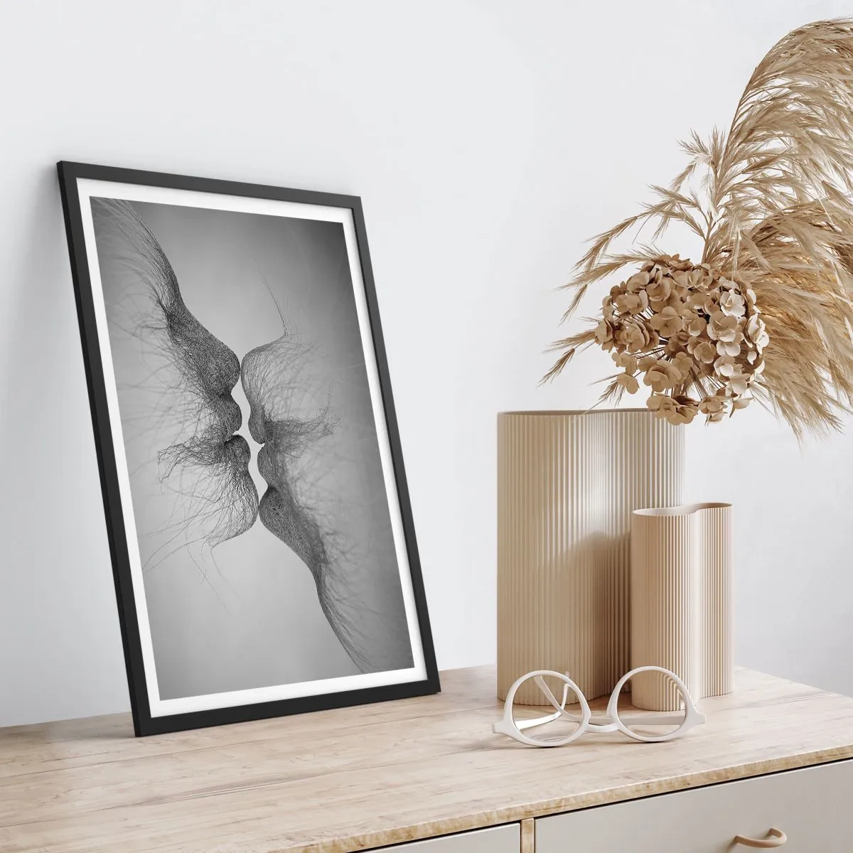 Plakat i sort ramme - Vindens kys - 61x91 cm