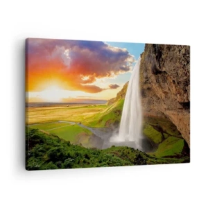 Lærredstryk - Billede på lærred - Et vandfald i et malerisk landskab ved solnedgang - 70x50cm - Den islandske sommers fylde - Moderne vægdekoration til stue og soveværelse ARTTOR