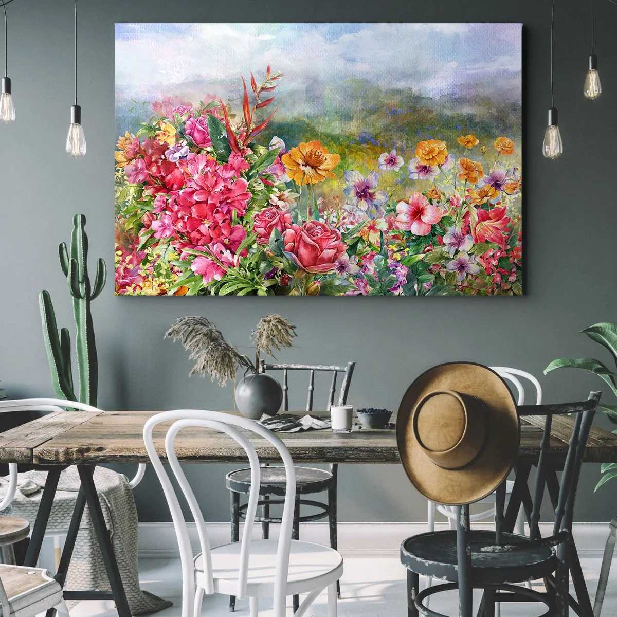 Lærredstryk - Billede på lærred - En farverig blomsterkomposition mod en pastelfarvet landskabsbaggrund - 70x50cm - En have, der er gået amok - Moderne vægdekoration til stue og soveværelse ARTTOR