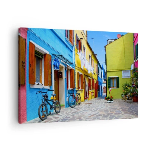 Lærredstryk - Billede på lærred - En farverig gade med cykler blandt pastelfarvede bygninger - 70x50cm - Pastel, sød gyde - Moderne vægdekoration til stue og soveværelse ARTTOR