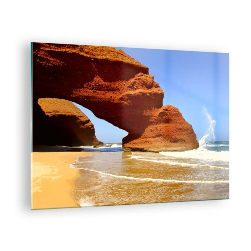 Billede på glas - Røde klippebuer over stranden og havet - 70x50cm - Vand og vind i tusindvis af år - Moderne vægdekoration til stue og soveværelse ARTTOR