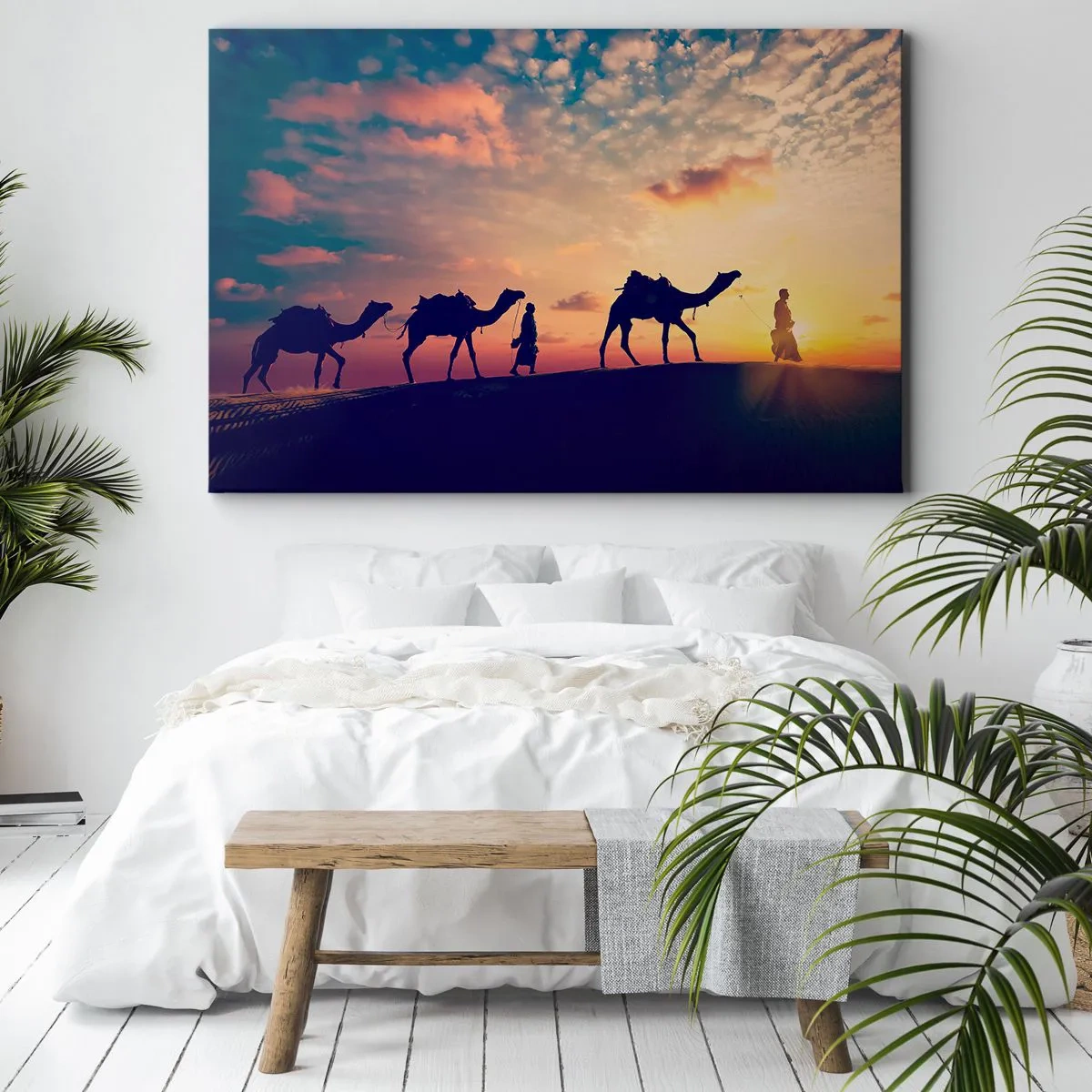 Lærredstryk - Billede på lærred - En karavane af kameler vandrer gennem ørkenen ved solnedgang - 70x50cm - Orientens mystiske ånd - Moderne vægdekoration til stue og soveværelse ARTTOR