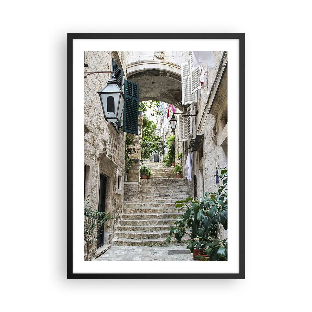Plakat i sort ramme - En charmerende baggyde - 50x70 cm