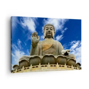 Lærredstryk - Billede på lærred - En monumental Buddha-statue mod en blå himmel med skyer - 70x50cm - Lev uden frygt - Moderne vægdekoration til stue og soveværelse ARTTOR