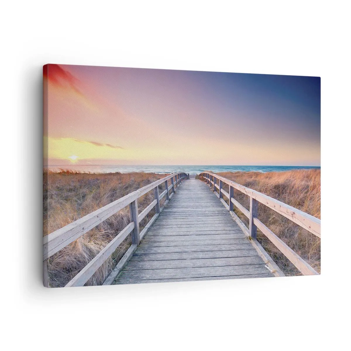 Lærredstryk - Billede på lærred - En træbro, der fører til stranden ved solnedgang med himlen malet i pastelfarver. - 70x50cm - Baltisk aften aura - Moderne vægdekoration til stue og soveværelse ARTTOR