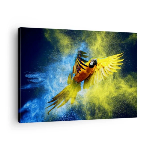 Lærredstryk - Billede på lærred - En papegøje i flugt mod en baggrund af farverige eksplosioner af gult og blåt. - 70x50cm - I det blå-gyldne støv - Moderne vægdekoration til stue og soveværelse ARTTOR