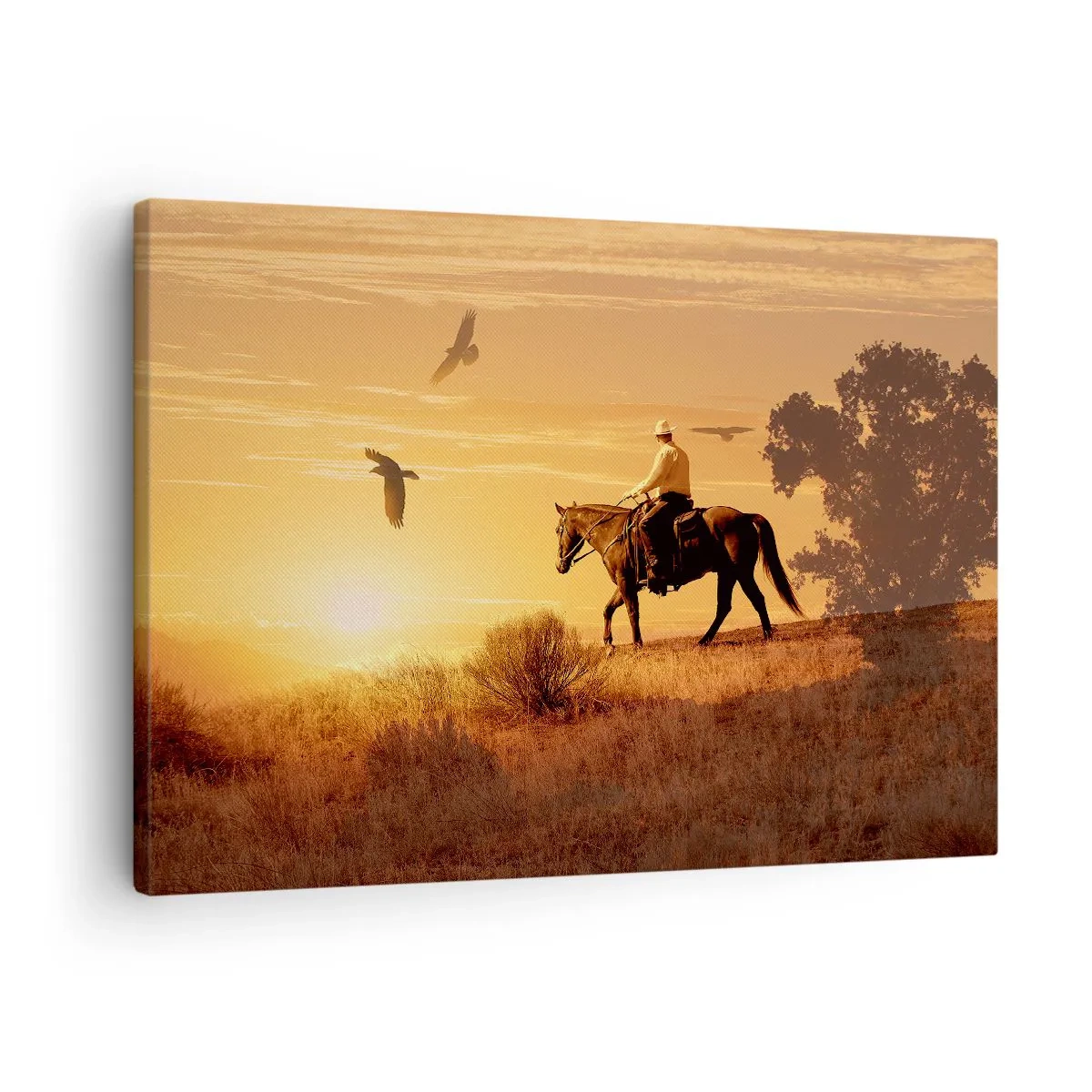 Lærredstryk - Billede på lærred - En rytter på en hest ved solnedgang mod prærien - 70x50cm - Alene på tværs af prærien - Moderne vægdekoration til stue og soveværelse ARTTOR
