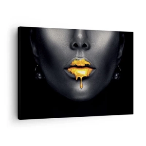 Lærredstryk - Billede på lærred - Sort og guld portræt af en kvinde med en dråbe guld på læberne - 70x50cm - Gyldenmund - Moderne vægdekoration til stue og soveværelse ARTTOR