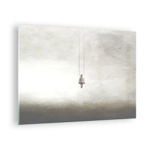 Billede på glas - En figur på en gynge, der hænger i himlen - 70x50cm - Barnet i os selv - Moderne vægdekoration til stue og soveværelse ARTTOR