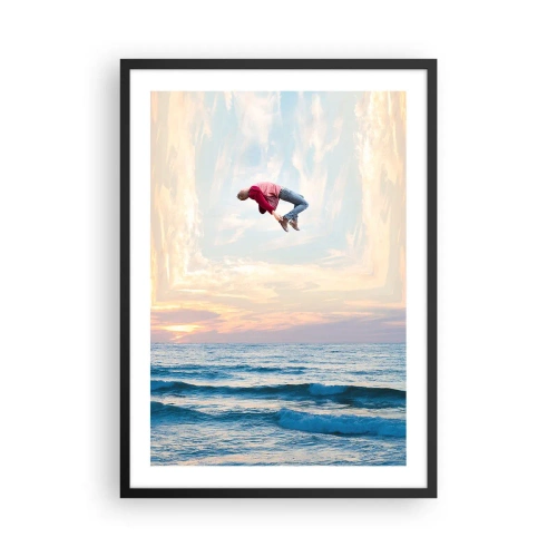 Plakat i sort ramme - En mand hopper op i himlen over havet ved solnedgang - 50x70cm - Til en anden dimension - Moderne vægdekoration til stue og soveværelse ARTTOR