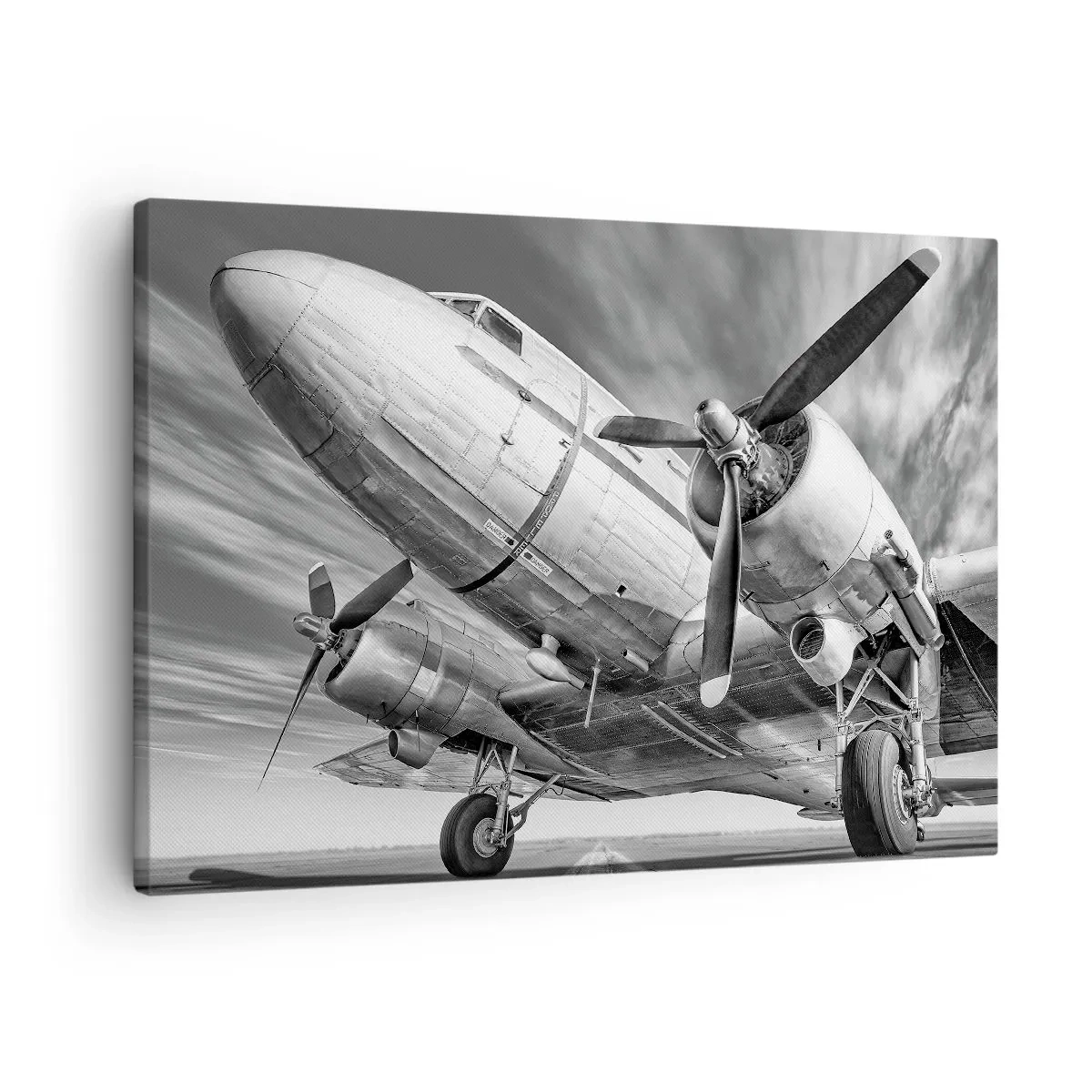 Lærredstryk - Billede på lærred - Et sort-hvidt billede af et klassisk fly med synlige strukturelle detaljer. - 70x50cm - Altid klar til at flyve - Moderne vægdekoration til stue og soveværelse ARTTOR
