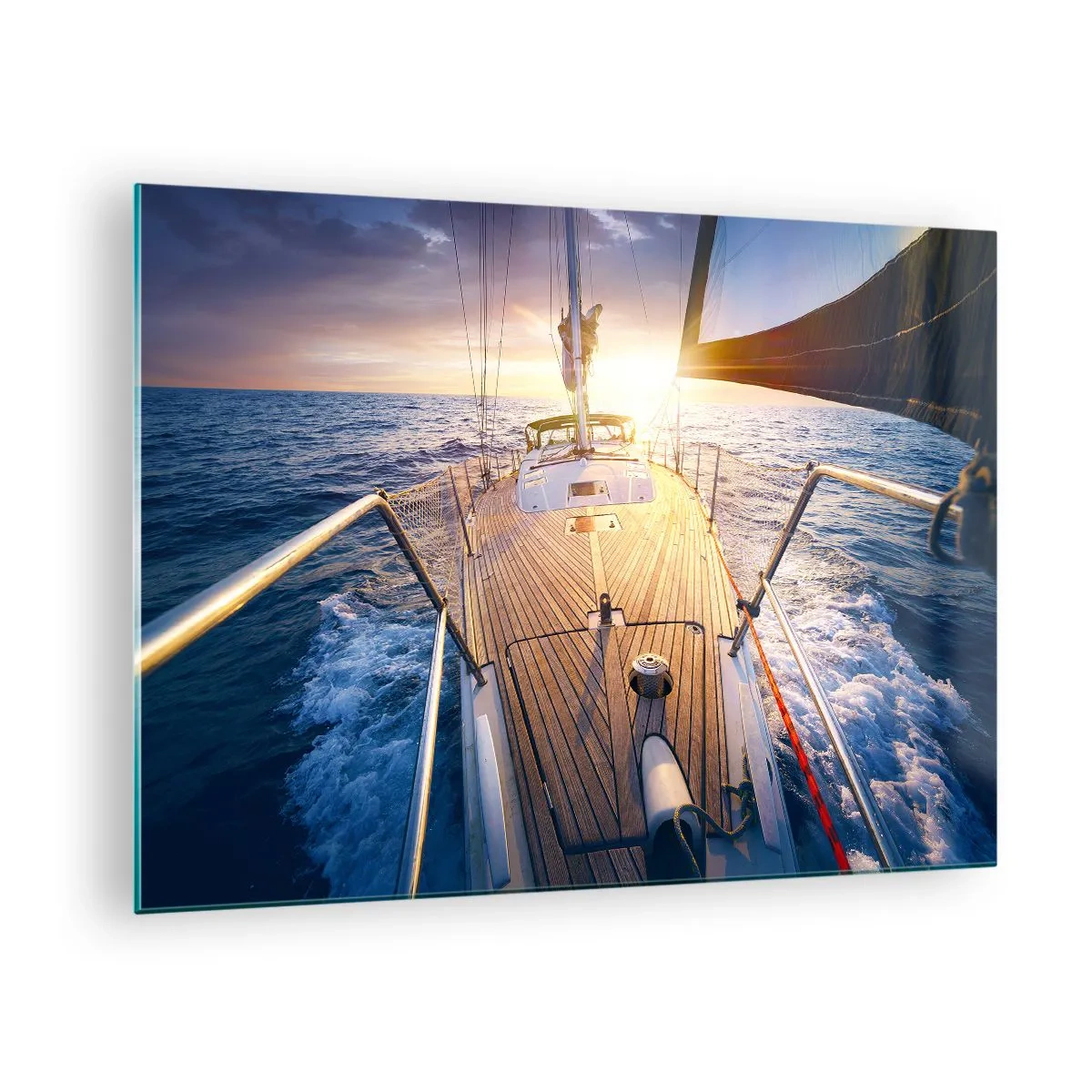 Billede på glas - Dækket på en sejlbåd mod baggrunden af den nedgående sol og havets bølger - 70x50cm - Løber på bølgerne - Moderne vægdekoration til stue og soveværelse ARTTOR