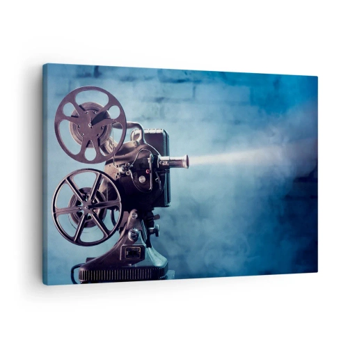 Lærredstryk - Billede på lærred - En gammel filmprojektor kaster lys mod en blå baggrund - 70x50cm - I en gammel biograf - Moderne vægdekoration til stue og soveværelse ARTTOR