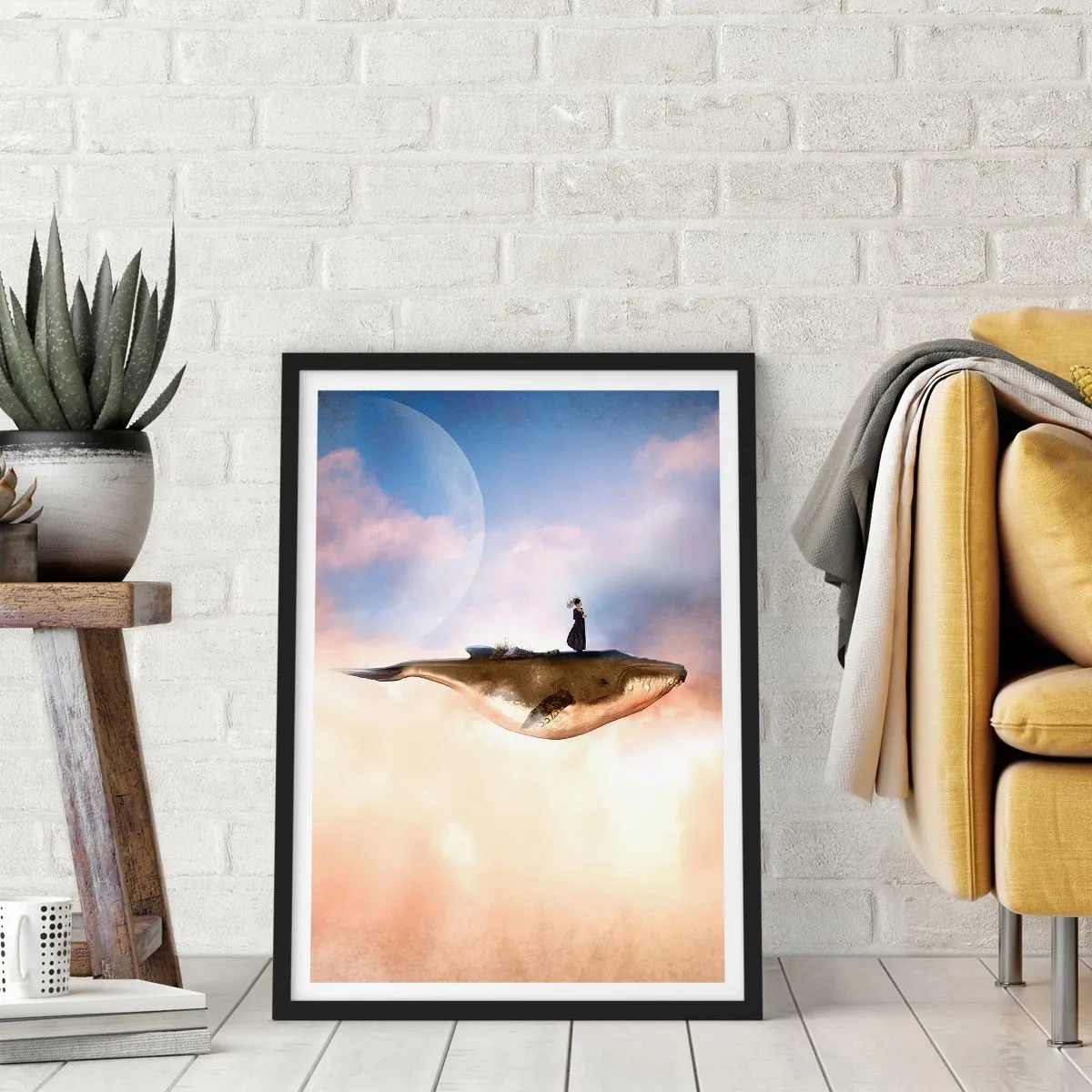 Plakat i sort ramme - Et surrealistisk maleri af en kvinde, der rider på en hval blandt skyerne. - 50x70cm - En surrealistisk rejse - Moderne vægdekoration til stue og soveværelse ARTTOR