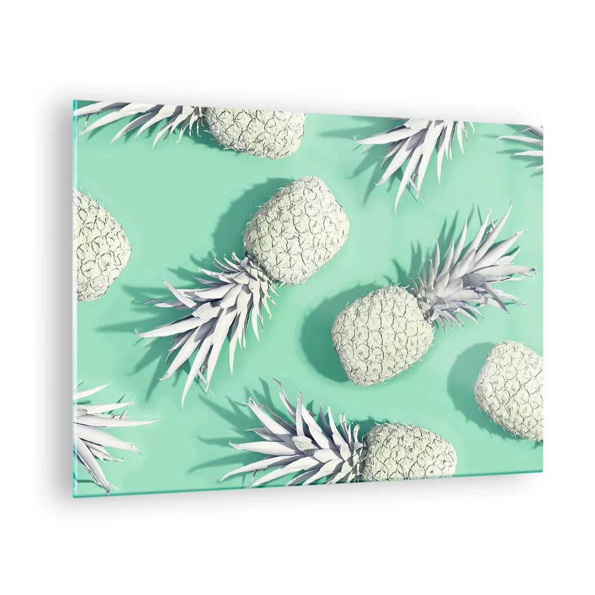 Billede på glas - Hvide ananas på en myntebaggrund i en kunstnerisk komposition - 70x50cm - passer godt sammen med mynte - Moderne vægdekoration til stue og soveværelse ARTTOR
