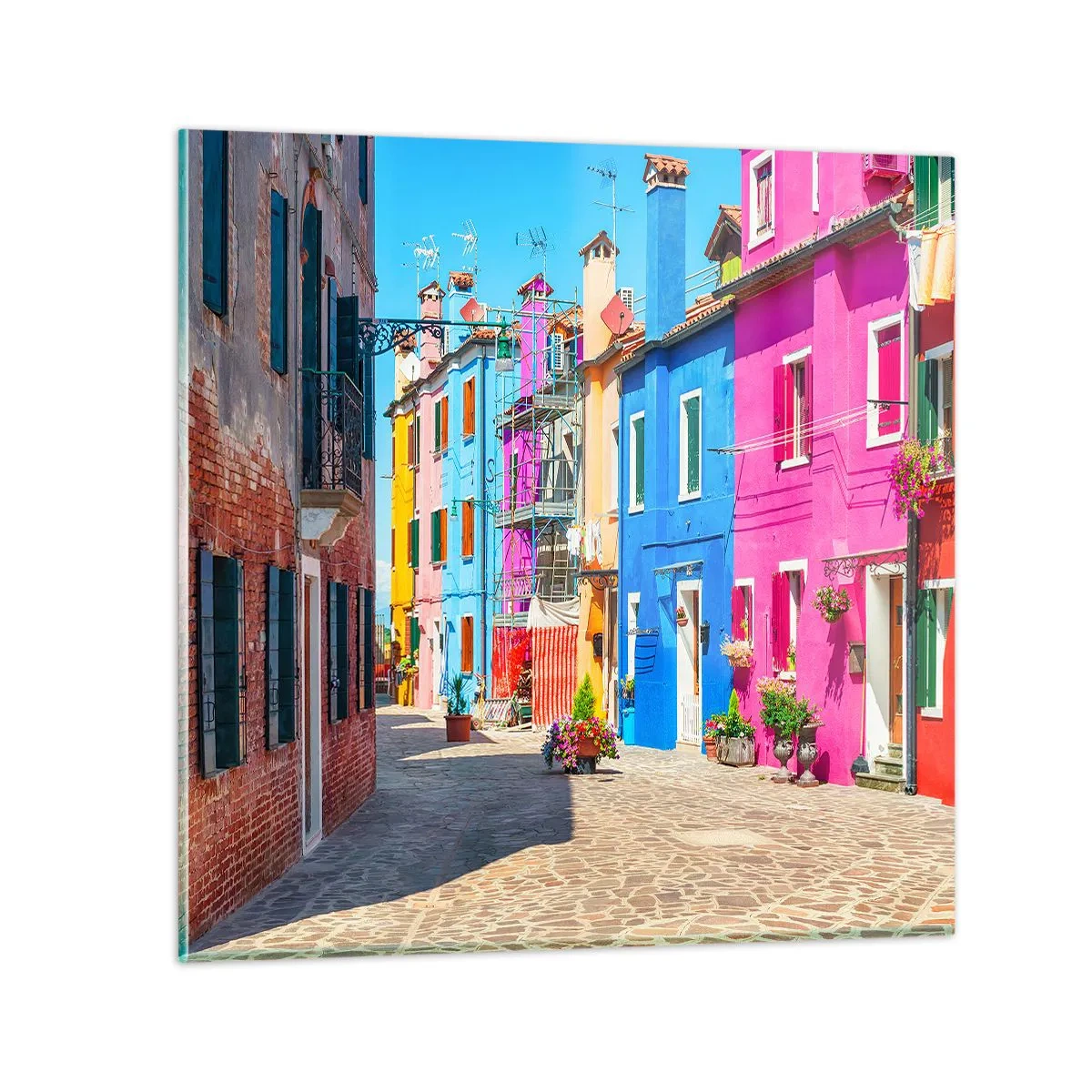 Billede på glas - Byen "Under papegøjer” - 50x50 cm