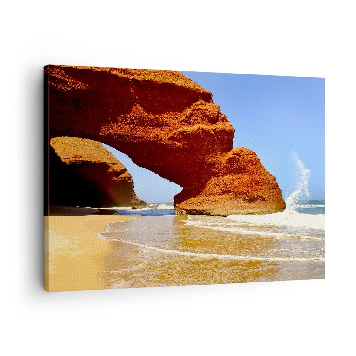 Lærredstryk - Billede på lærred - En naturlig klippebue på en strand med blå himmel og bølger - 70x50cm - Vand og vind i tusindvis af år - Moderne vægdekoration til stue og soveværelse ARTTOR