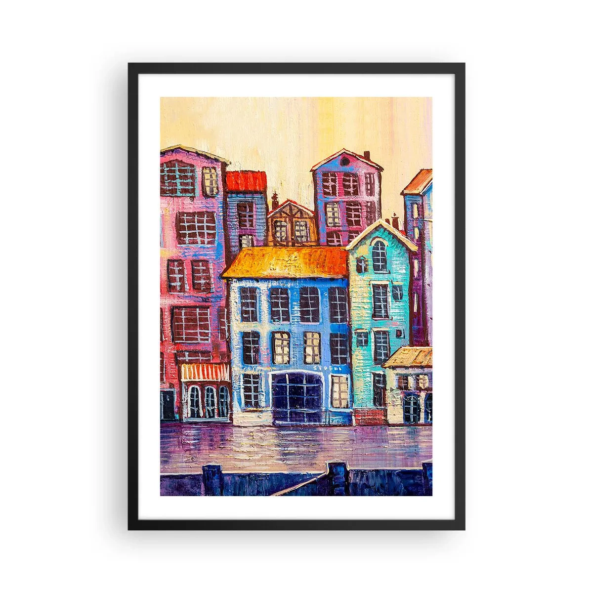 Plakat i sort ramme - Farverige lejlighedshuse ved vandet i malerisk stil - 50x70cm - En by som et eventyr - Moderne vægdekoration til stue og soveværelse ARTTOR