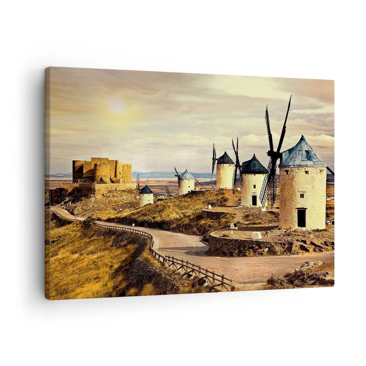 Lærredstryk - Billede på lærred - Vindmøller på bakkerne med et historisk slot i baggrunden - 70x50cm - Don Quixote er ved at dukke op - Moderne vægdekoration til stue og soveværelse ARTTOR