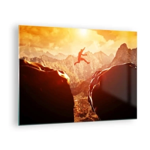 Billede på glas - Springe over en kløft i et bjerglandskab ved solnedgang - 70x50cm - Overskridelse af grænser - Moderne vægdekoration til stue og soveværelse ARTTOR