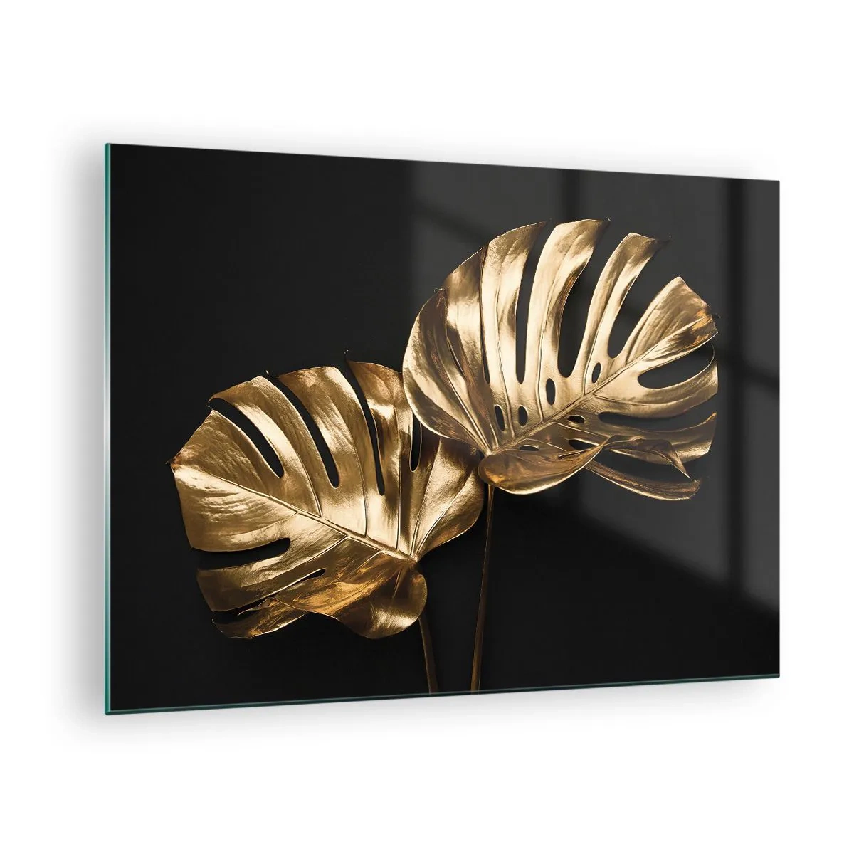 Billede på glas - Gyldne monsterablade på en sort baggrund - 70x50cm - Naturens skatte - Moderne vægdekoration til stue og soveværelse ARTTOR