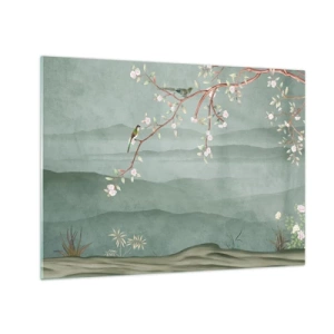 Billede på glas - En gren med blomster og fugle mod en baggrund af grønne bakker - 70x50cm - Forår, ah, det er dig - Moderne vægdekoration til stue og soveværelse ARTTOR