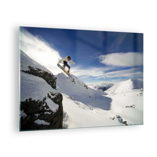 Billede på glas - En snowboarder hopper ud fra en klippe i bjergene om vinteren - 70x50cm - Frihed uden grænser - Moderne vægdekoration til stue og soveværelse ARTTOR