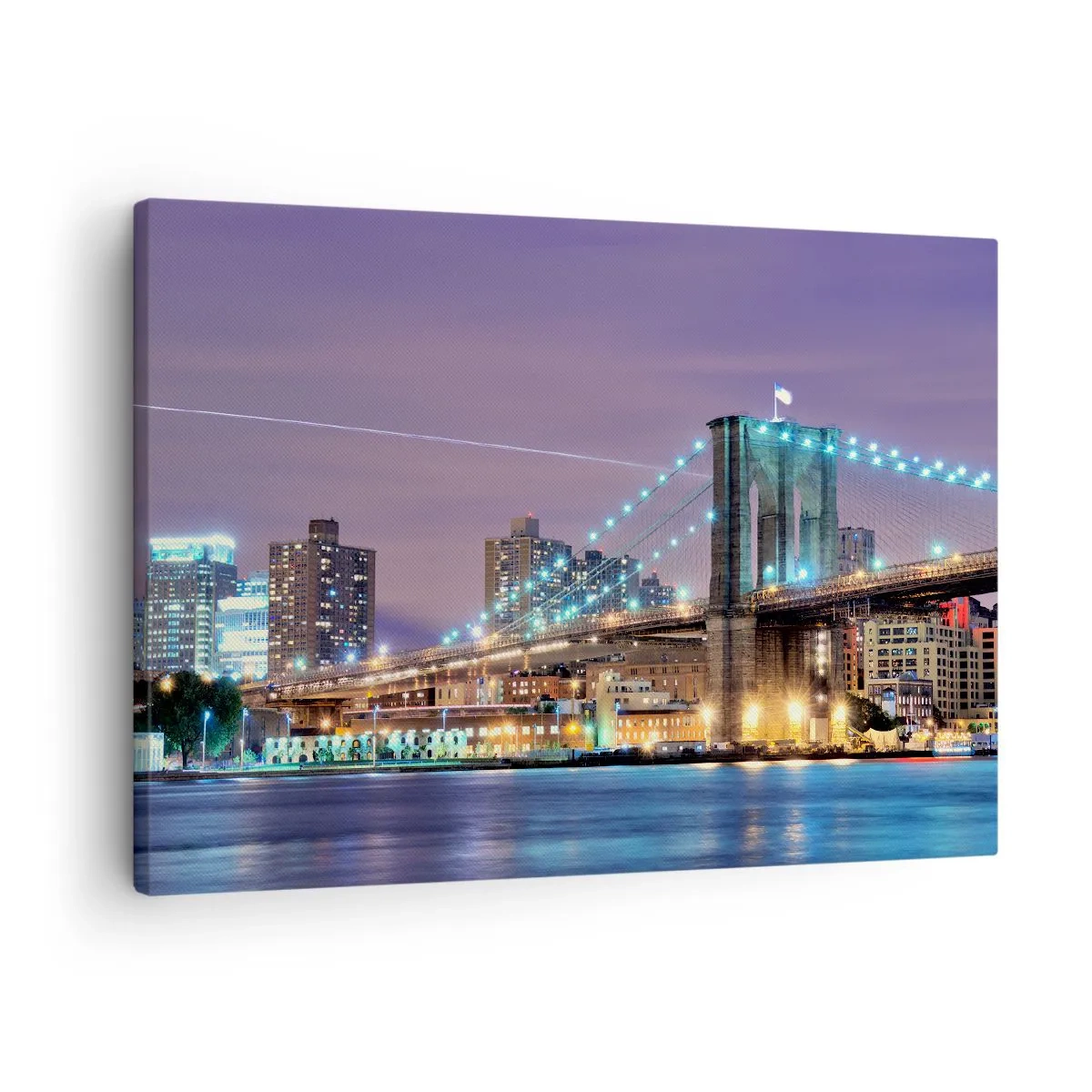 Lærredstryk - Billede på lærred - Brooklyn Bridge om natten med byen oplyst i baggrunden - 70x50cm - I mange år har Brooklyn Bridge - Moderne vægdekoration til stue og soveværelse ARTTOR